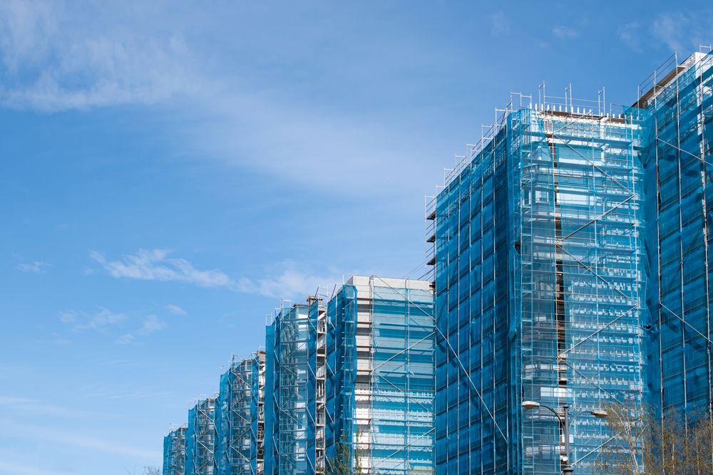 Glass towers in Miami under a blue sky